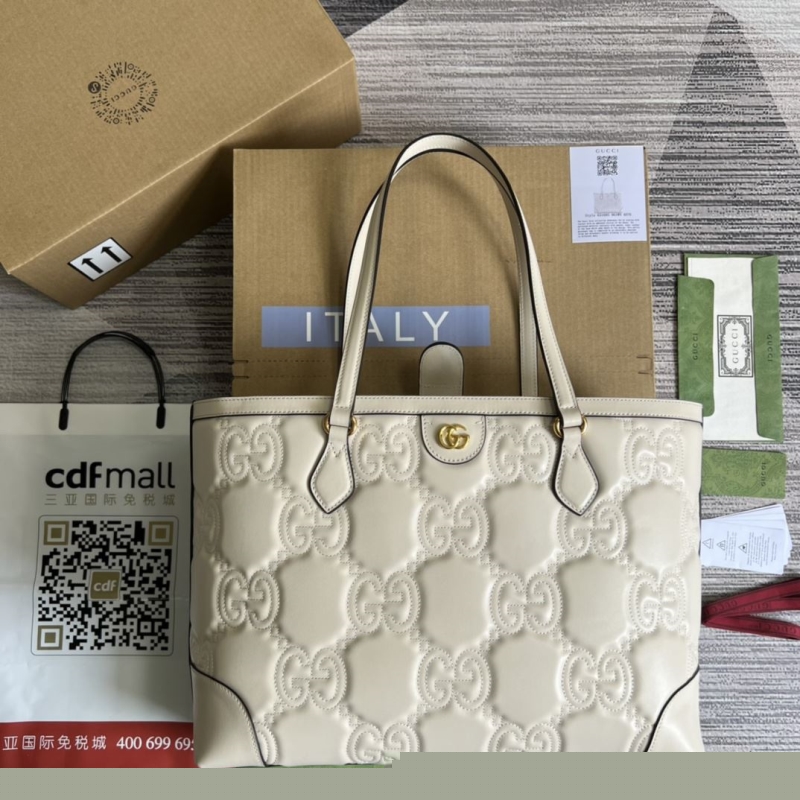 G*u*i shopping bags